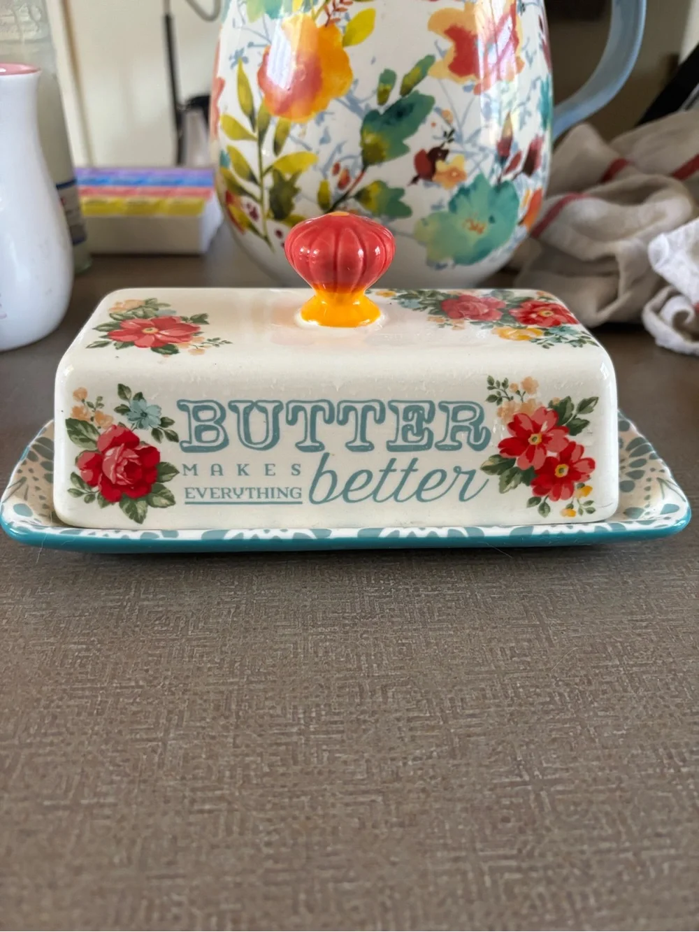 The Pioneer Woman Floral Ceramic Butter Dish with Red Knob and Teal Accents